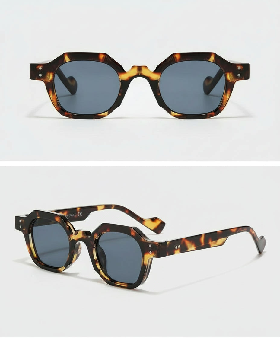 Sunglasses with tortoiseshell frame and dark lenses on a white background