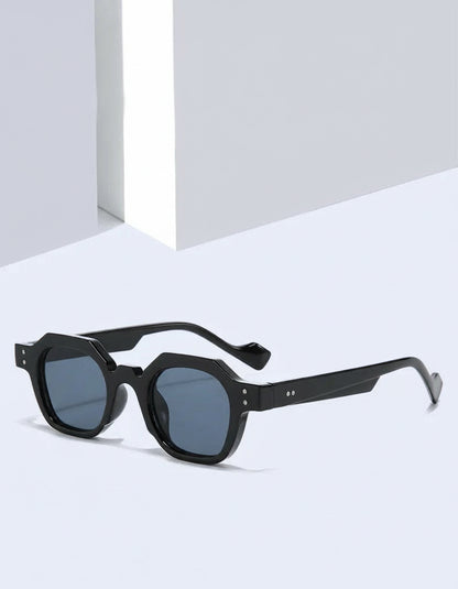 Black sunglasses on a light gray background with 'Fashion Style New Arrivals' text.